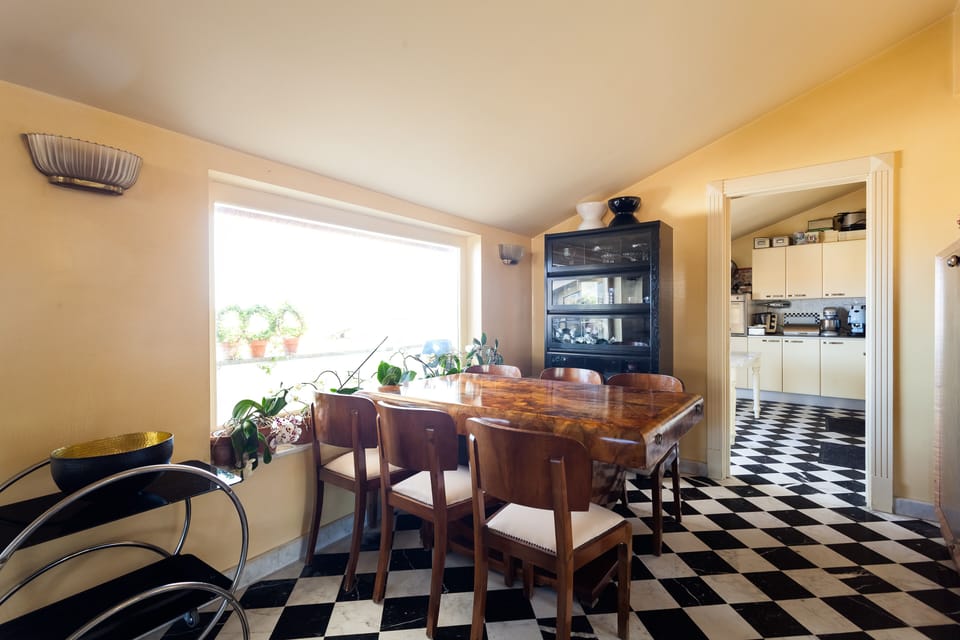 Dining area with large window and sea-view