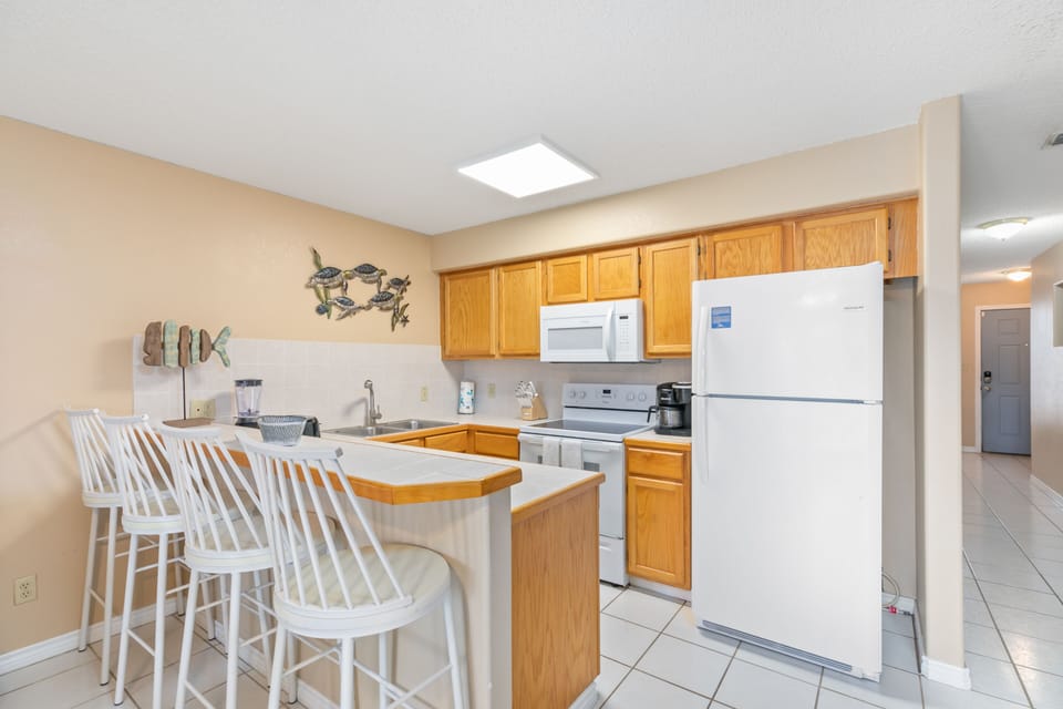 Kitchen is fully stocked with pots, pans and dishware needed for your home cooked meals.