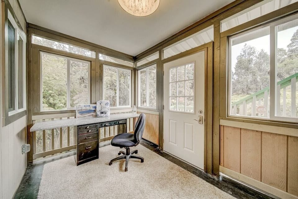 If you must work, do so here with gorgeous views in the office. If you need a quick break, you can quickly escape outside and enjoy tropical views through the private door.  It also provides an additional area for sleeping