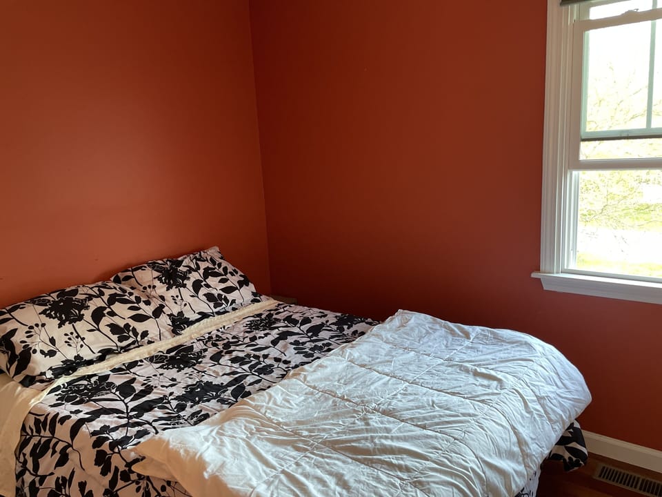 Second floor bedroom with queen bed. 