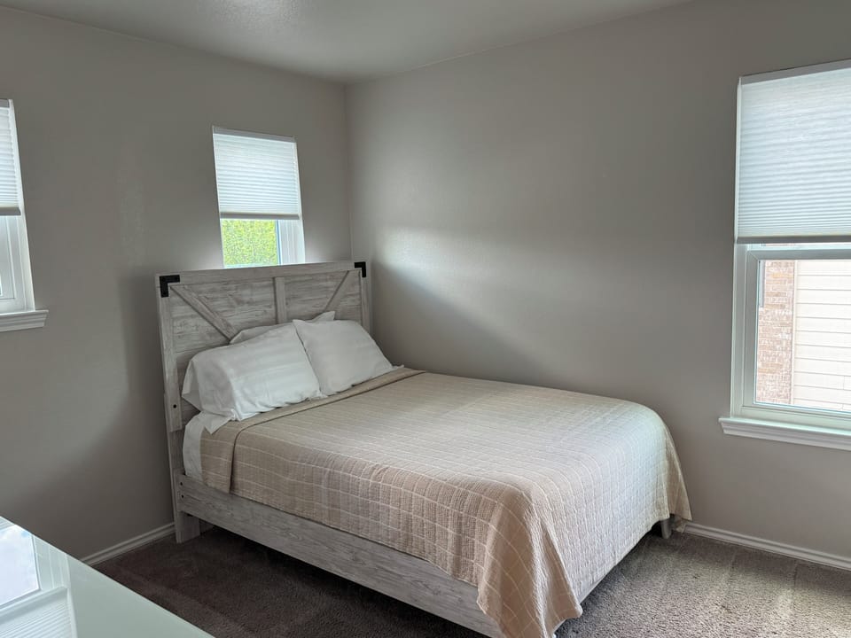 Third bedroom has full-size bed, dresser, and closet is lock for storage.