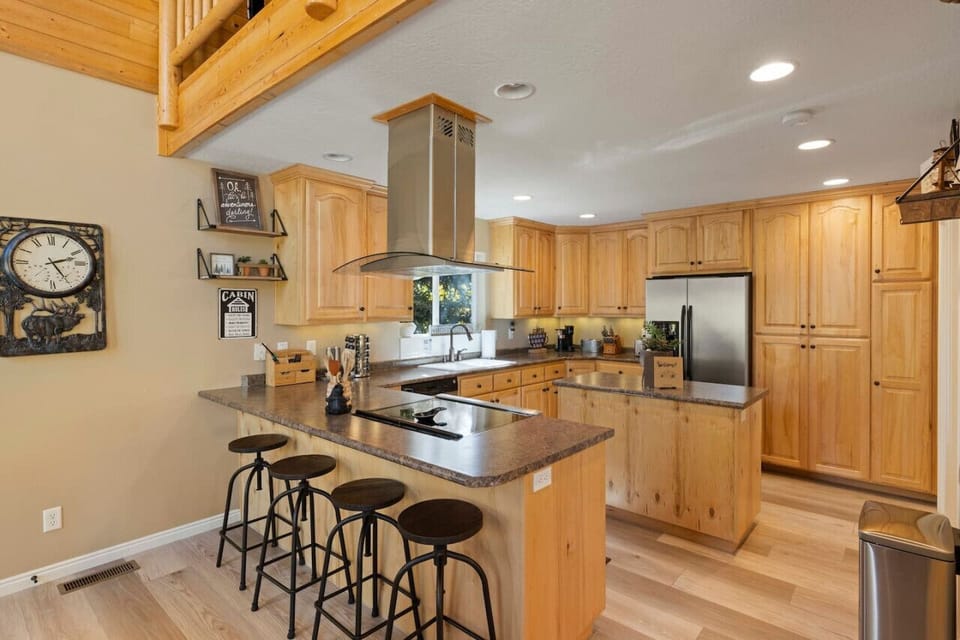 Spacious, stylish, and functional—this kitchen is ready for any feast.