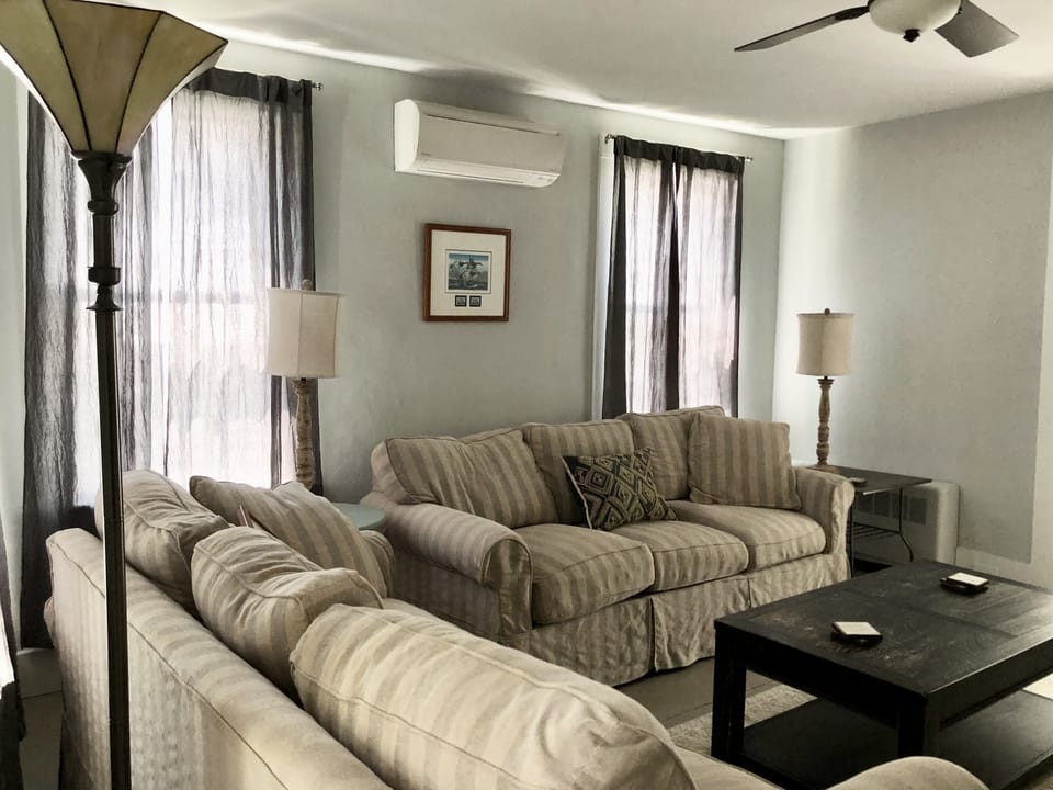 Comfy and cool in the living room with a 55" TV.  