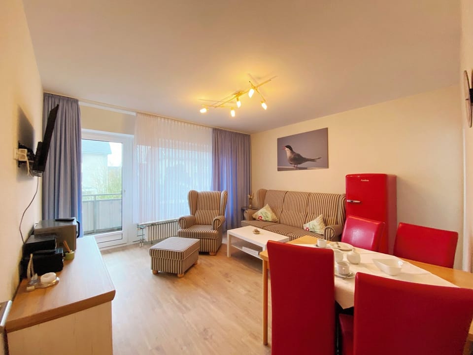 Living room, sofa, TV, balcony, dinning table