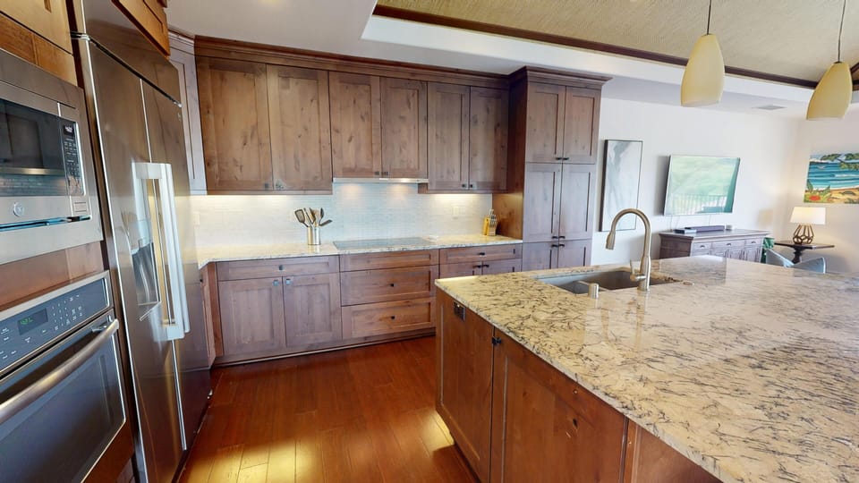 Gourmet kitchen with a great assortment of spices, oils and essentials provided