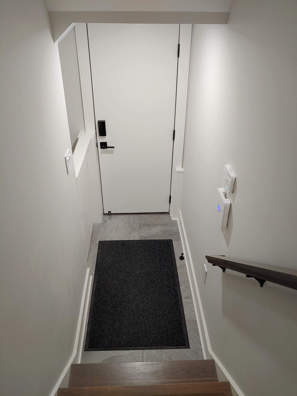 Side entry with alarm panel (optional).
