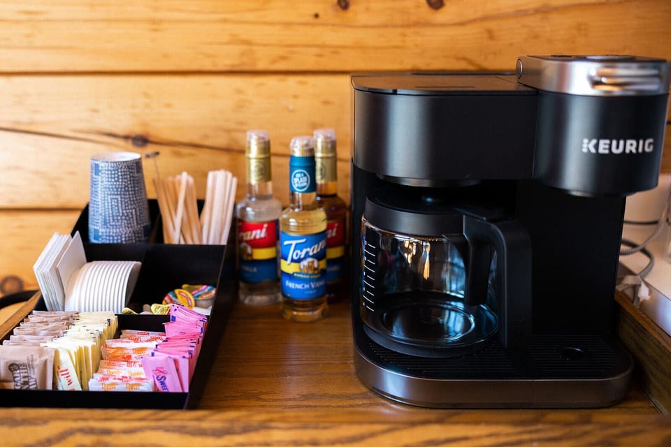 Dual Keurig coffee maker provided with a wide selection of flavors, sugars,etc. 