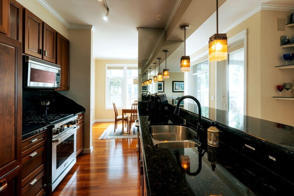 Kitchen with High End Appliances and Gas Range