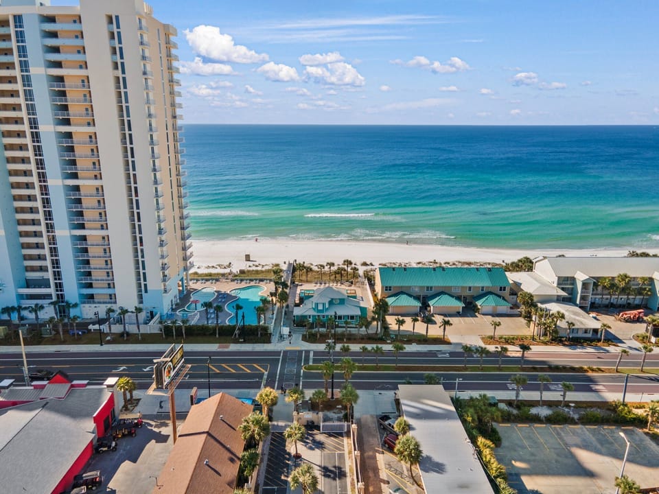 Cross the street to the beautiful white sandy beach