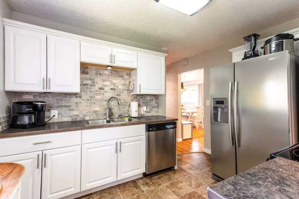 Kitchen with coffee bar and dishwasher