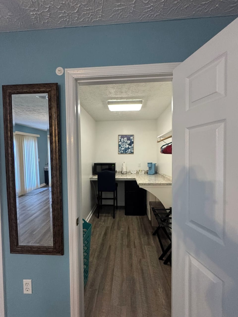 In room microwave, Keurig coffee maker, mini-fridge. (In walk-in closet)