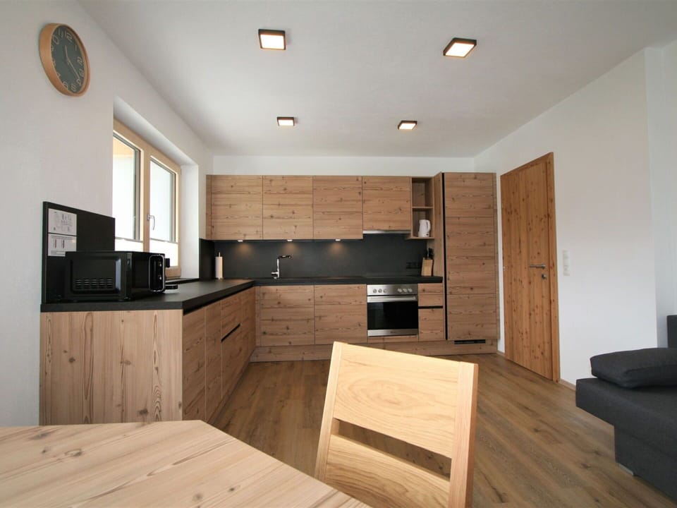 Cabinetry, Furniture, Property, Countertop, Wood, Lighting, Interior Design, Drawer, Flooring, Wood Stain