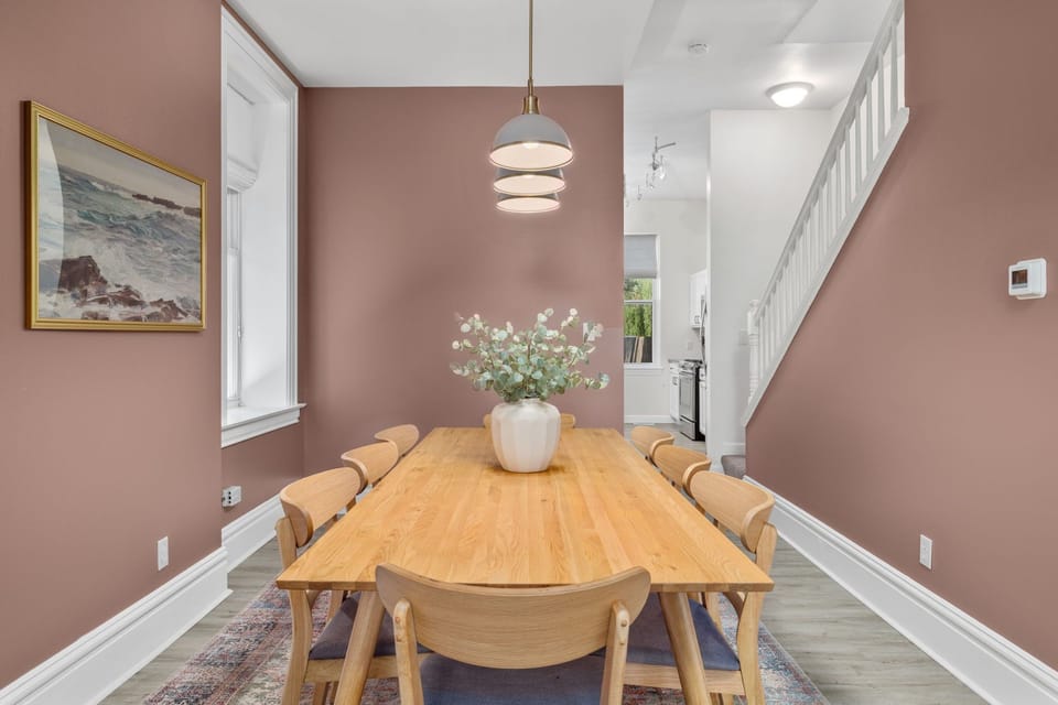 Large dining room table seats eight.