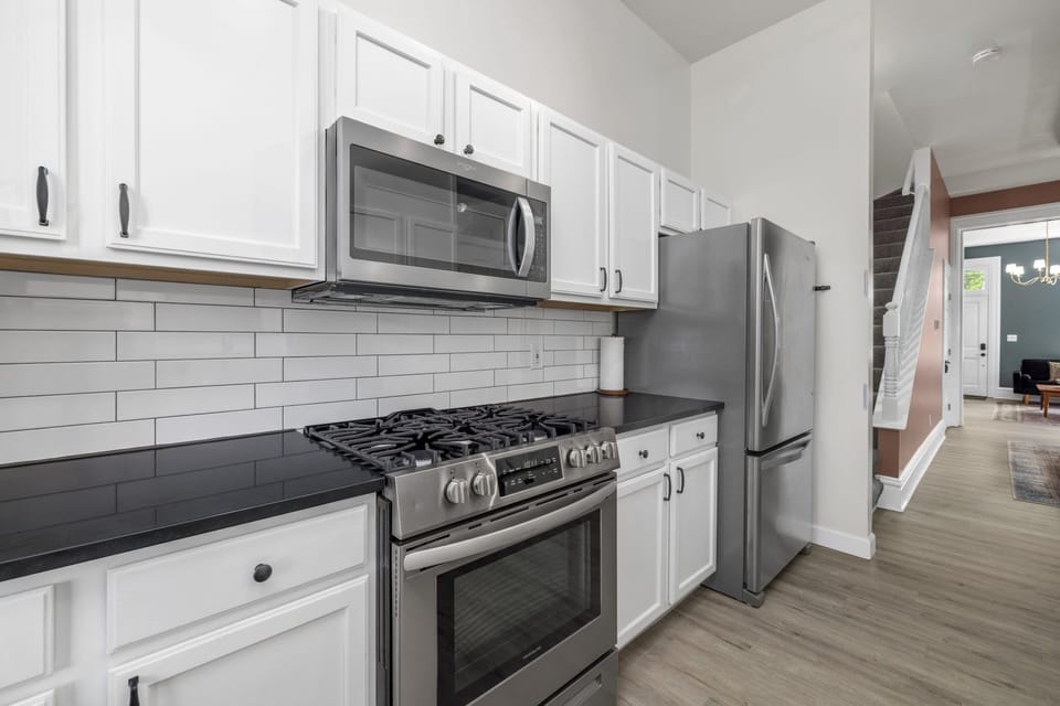 Kitchen features all new stainless steel appliances and gas stove.