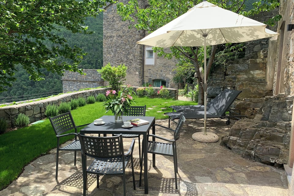 Seating for private dining in own private garden , another seating area is around the corner 