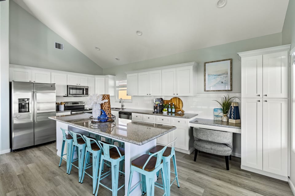 Cook like a pro in the fully equipped kitchen featuring granite countertops, stainless-steel appliances, and all the tools you need. Whether it's a quick breakfast or a full dinner, everything is ready for you.