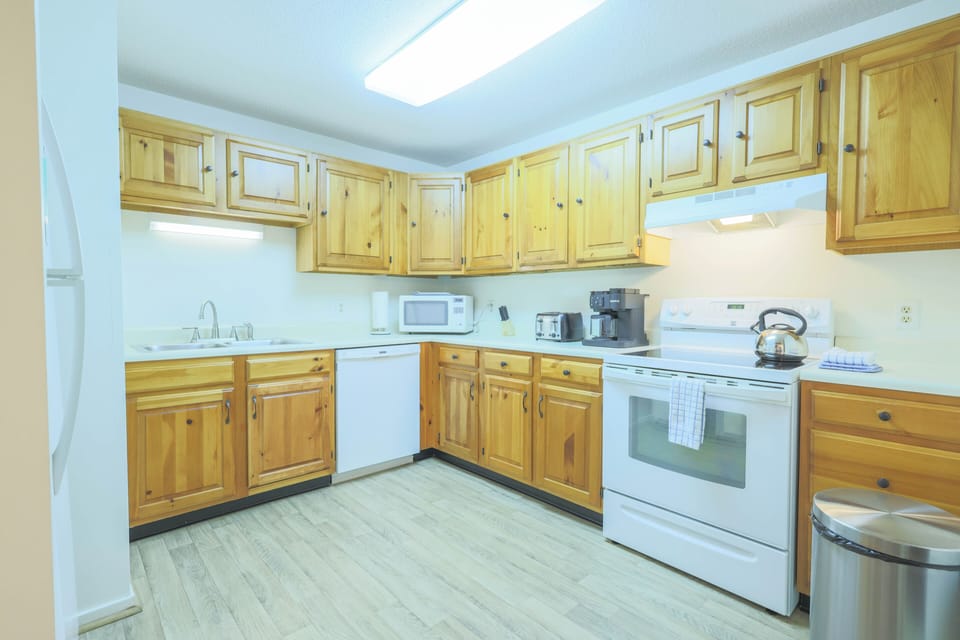 Kitchen complete with full-size appliances, flatware, dishware, glassware, pot & pans and cooking utensils