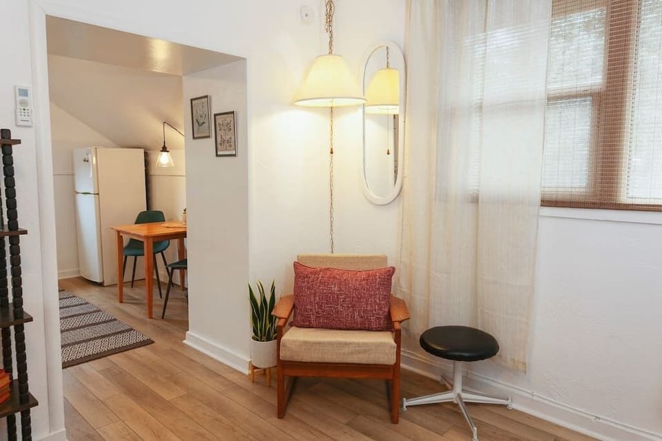 A cozy reading nook with warm lighting for quiet relaxation.
