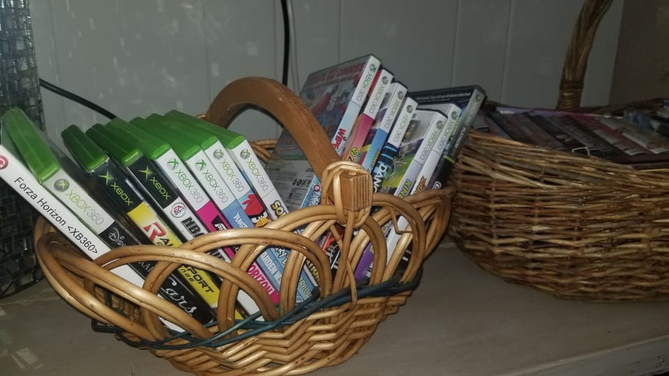 Xbox games and movie DVDs available