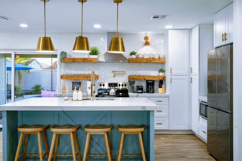 Kitchen alternate view with island and modern appliances