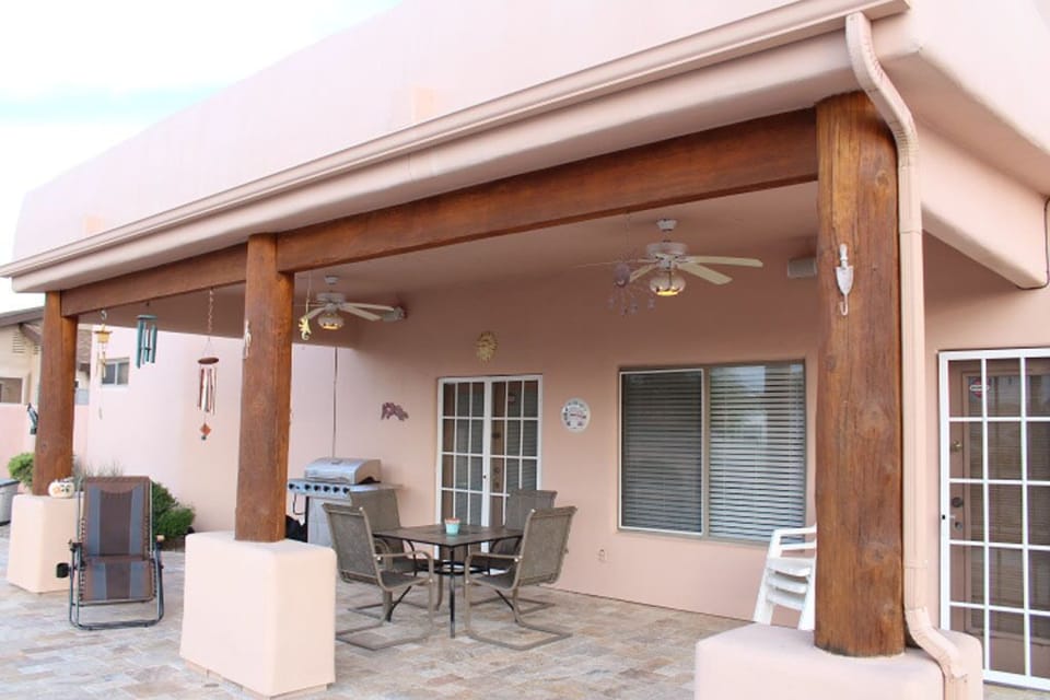 Nice covered patio with BBQ and seating 