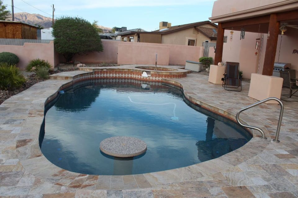 Great pebble tech pool and spa with inside table 