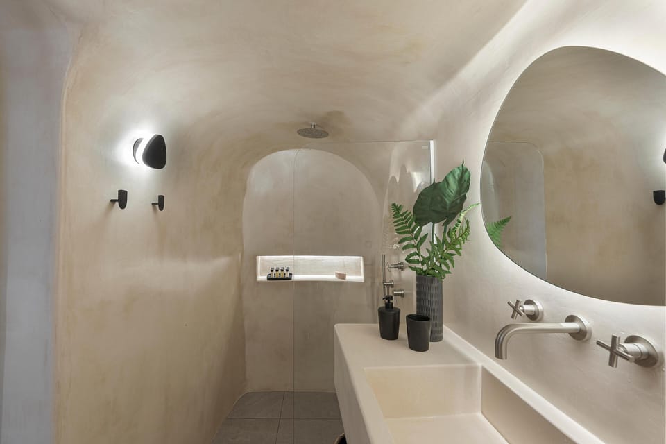 Bathroom, sink and rainfall shower