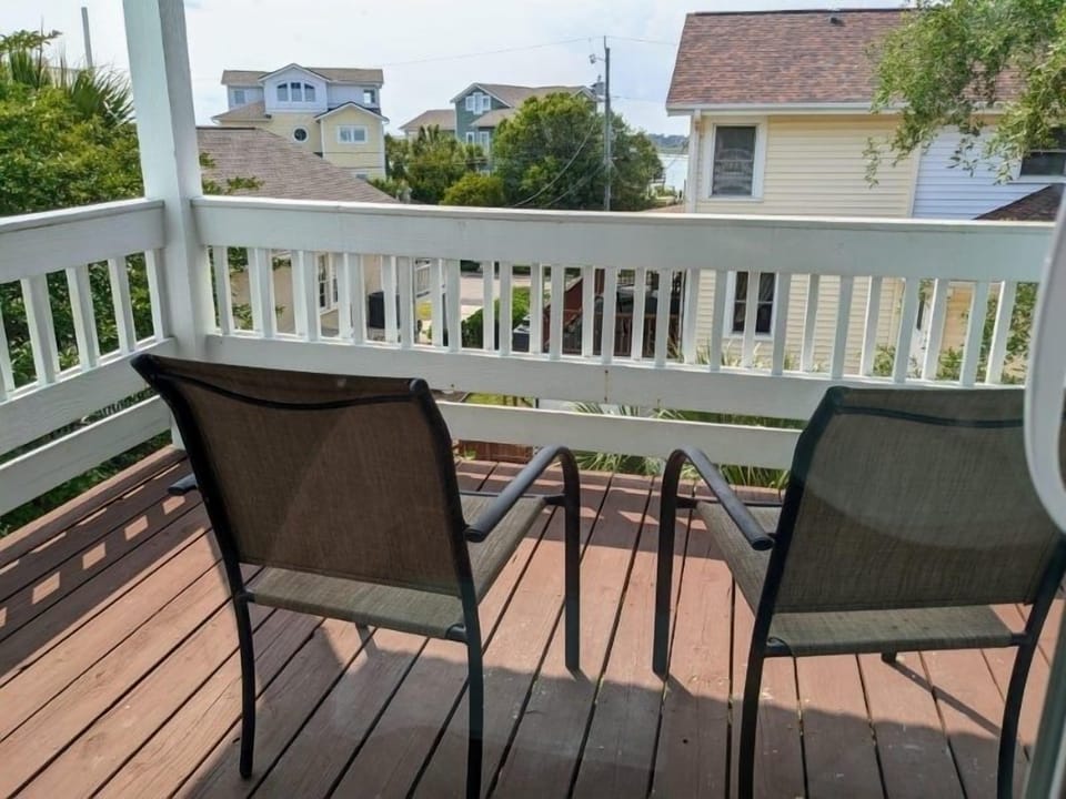 Private balcony off downstairs bedroom w Queen size bed.