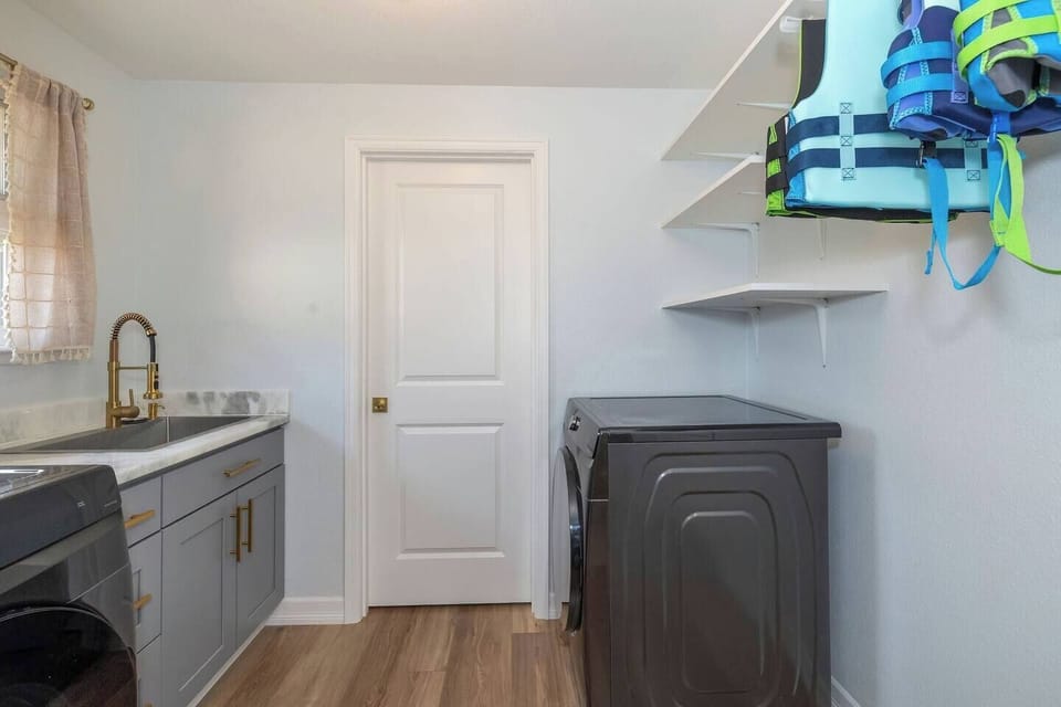 Laundry room with laundry essentials provided