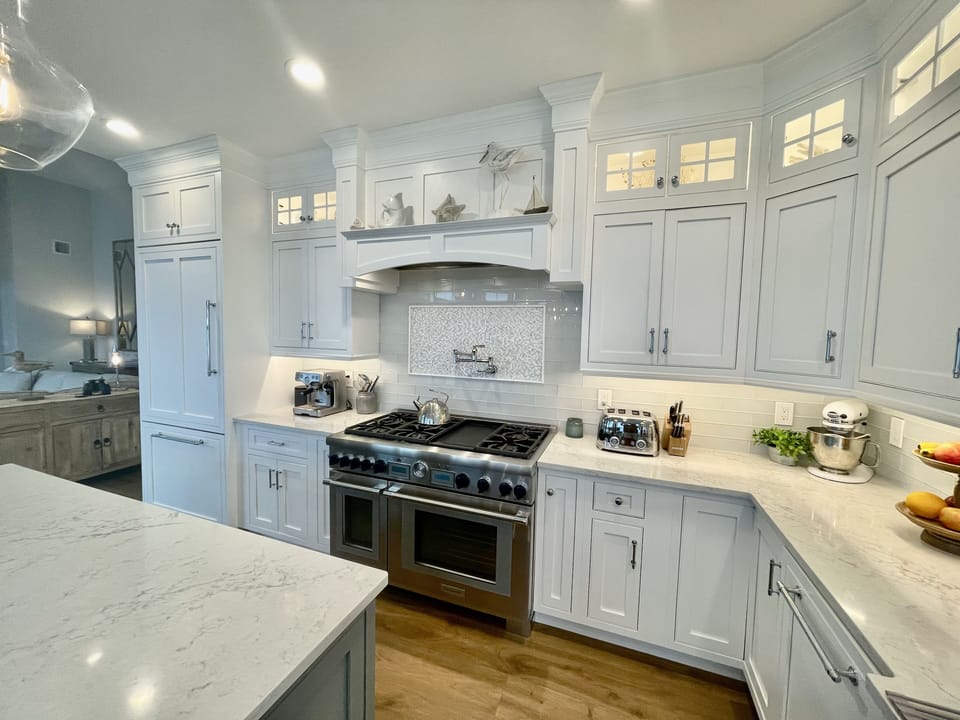 High end kitchen with 48" stove with 6 burners and griddle
