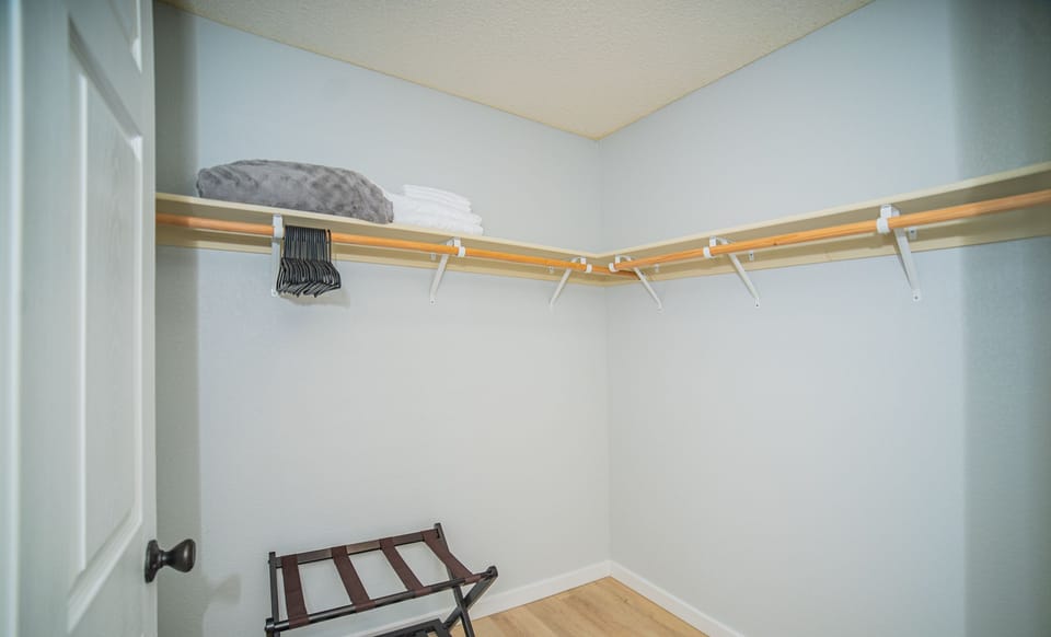 Luggage rack, hangers, extra blankets and sheets provided in each room