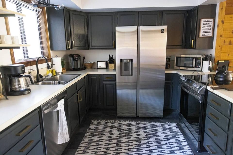Bright, stylish kitchen dressed in chic gray tones