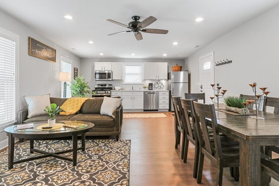 Open concept kitchen to dining and sitting room, upper level