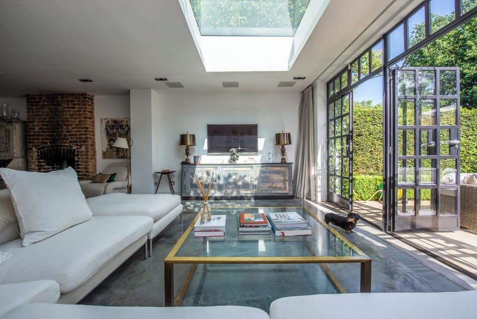 sitting area with large screen for Netflix and Apple TV