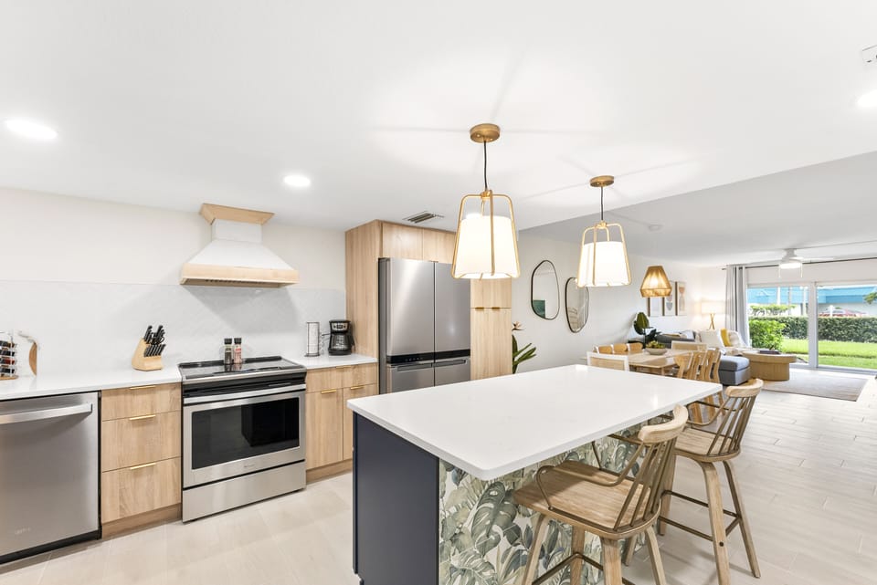 Sleek modern kitchen with high-end appliances and an inviting island