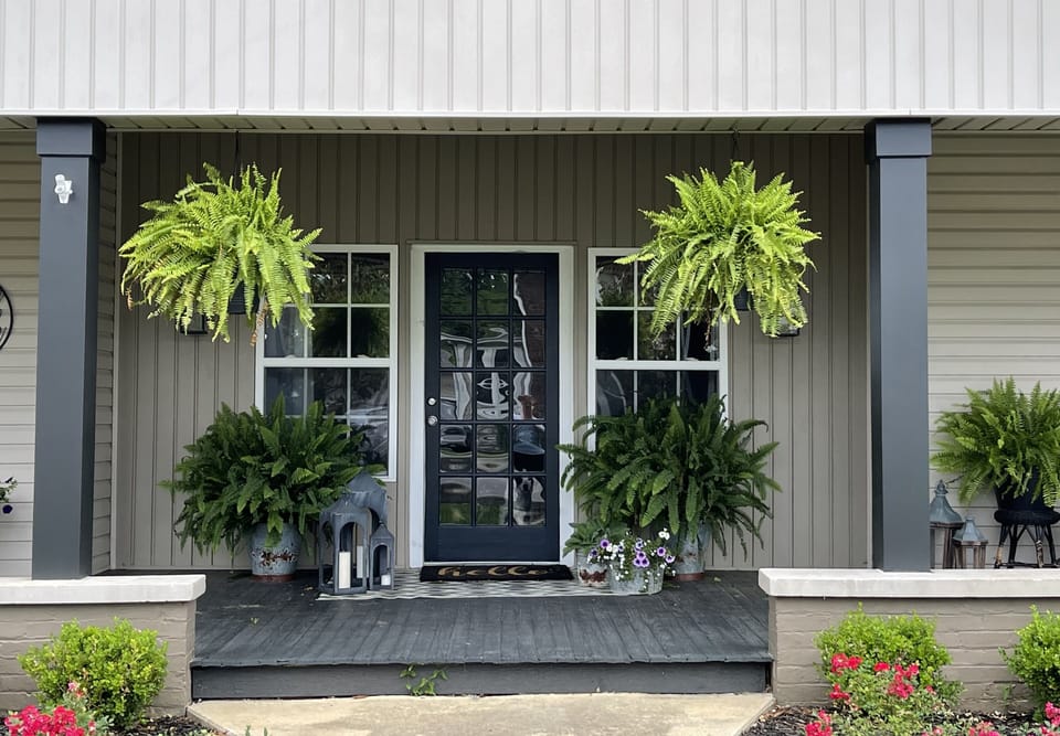 Welcome! (Summer view of the front porch.)