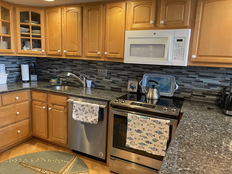 updated kitchen with granite counters