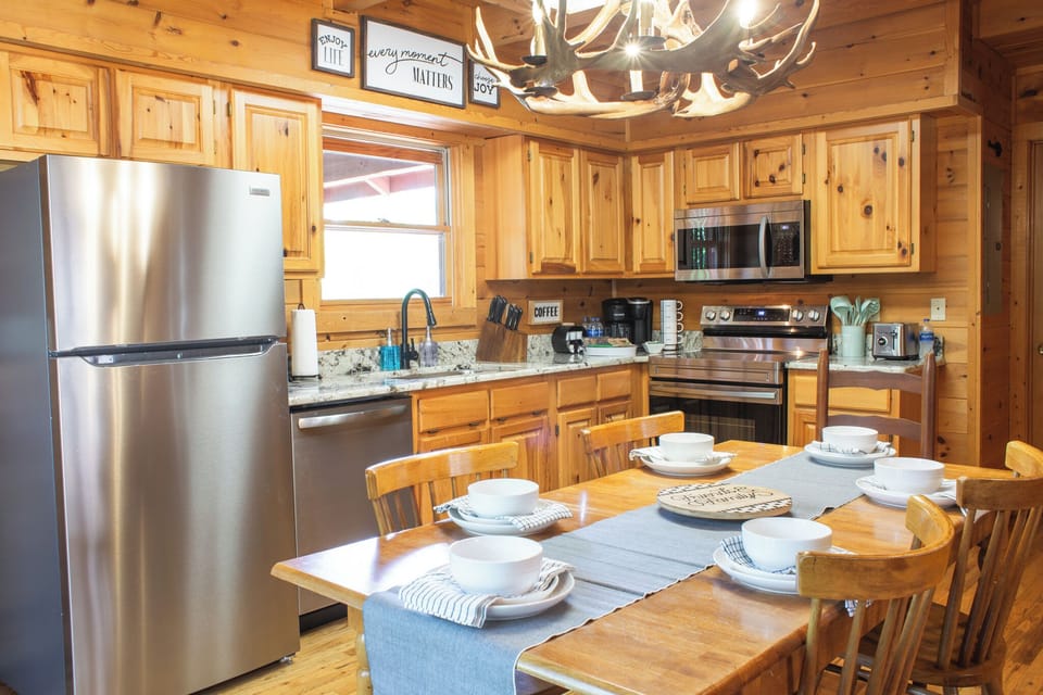 Fully stocked kitchen with All Clad pots and pans.