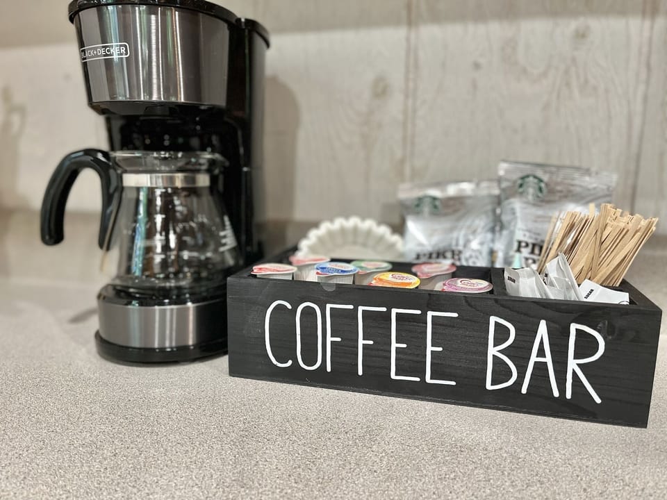 Coffee bar with Starbucks coffee, flavored creamers and coffee filters