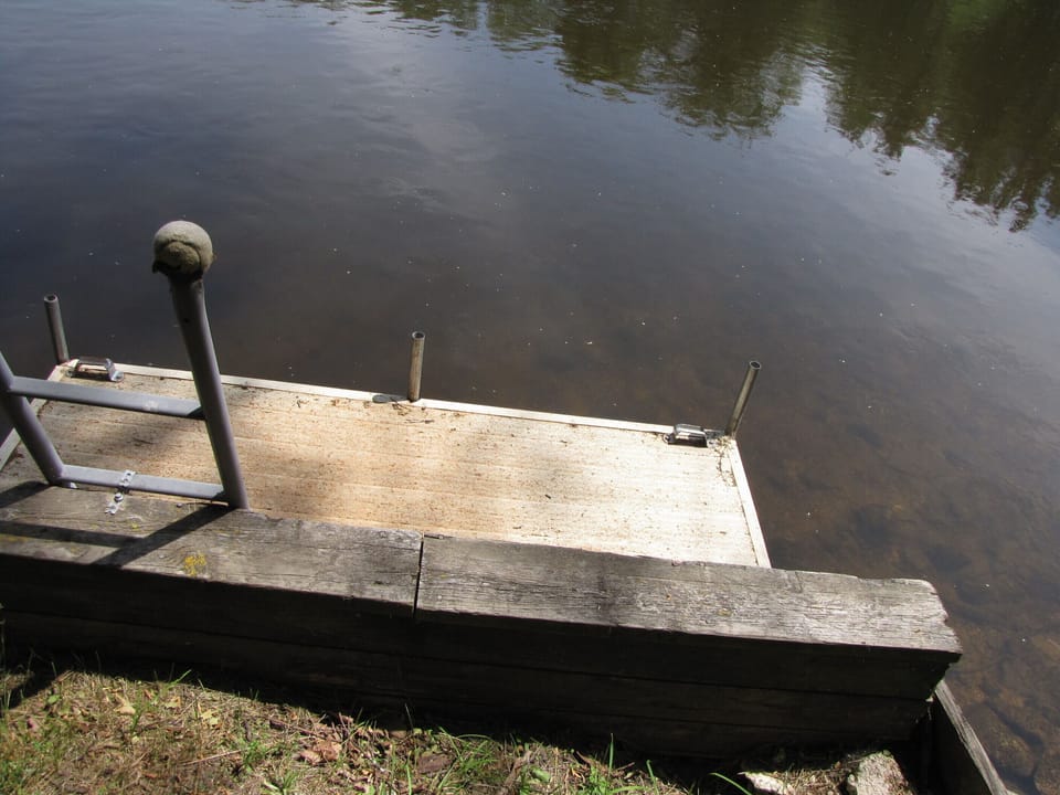 Small dock to fish off of or get into the water easier.