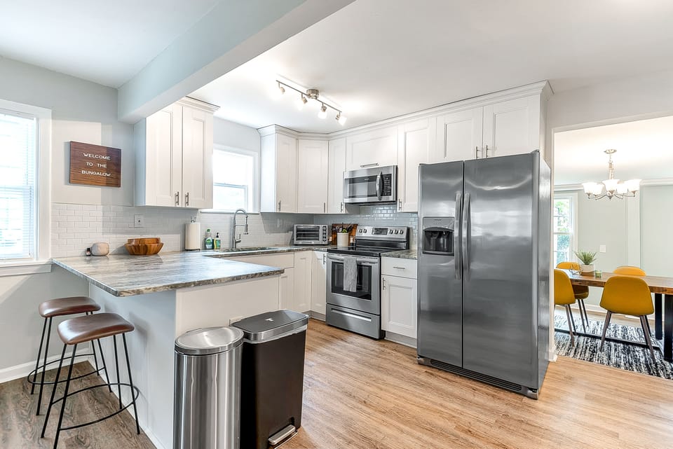 Remodeled kitchen with stainless steel appliances.