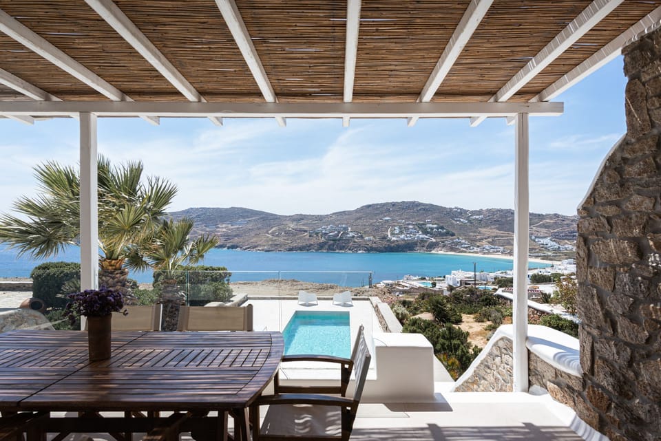 Outside Dining Area With Pool View