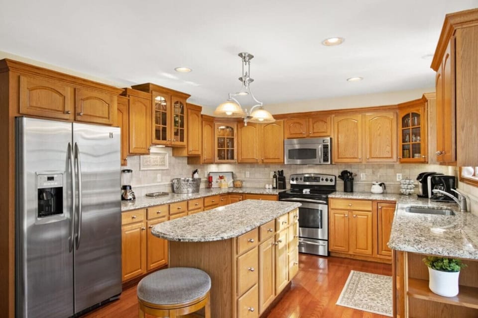 **Kitchen** Large kitchen ready to handle the needs of any chef in the family!  In the morning, grab your coffee from the coffee bar and head out to the back deck!