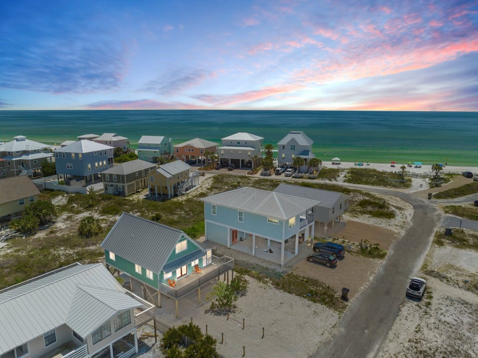 Steps from the shore, this 3-bedroom, 2-bath home offers beachside bliss. 