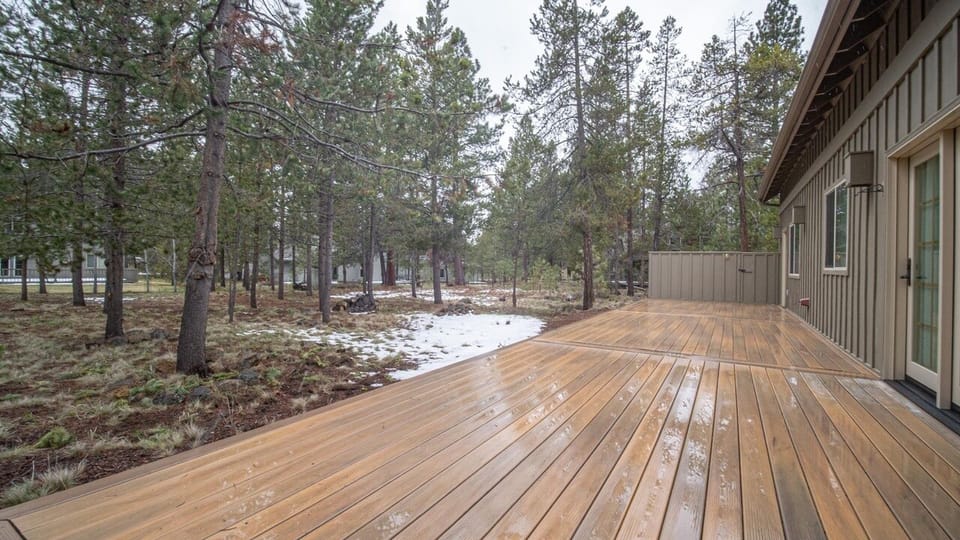 back deck - has BBQ, chairs, and chaise lounge.