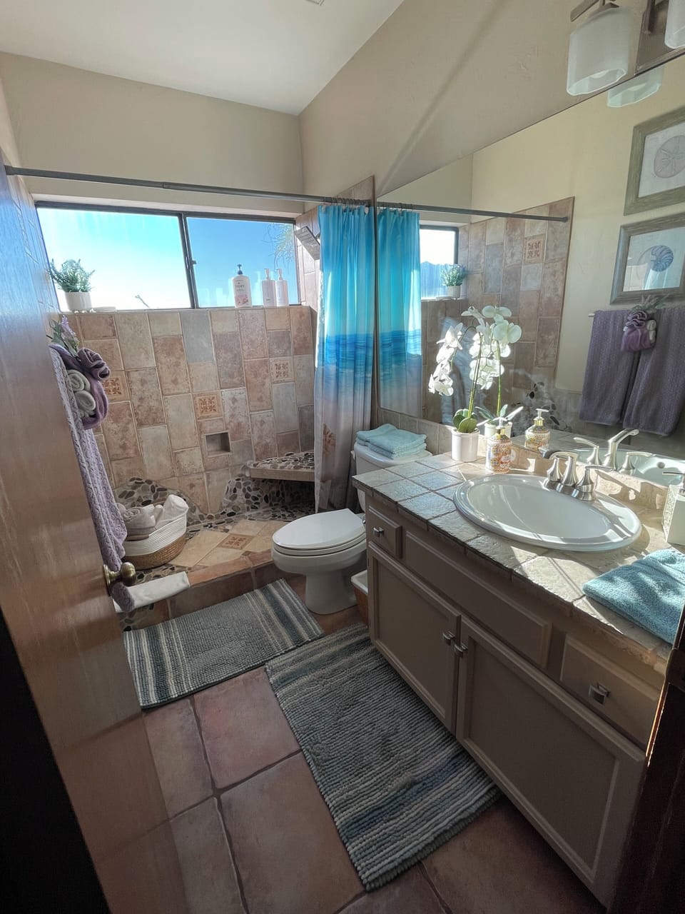 Hallway bathroom easily accessible for all.