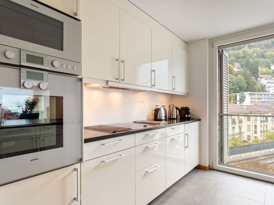 Cabinetry, Countertop, Window, Kitchen Appliance, Kitchen Stove, Kitchen, Wood, Home Appliance, Interior Design, Floor
