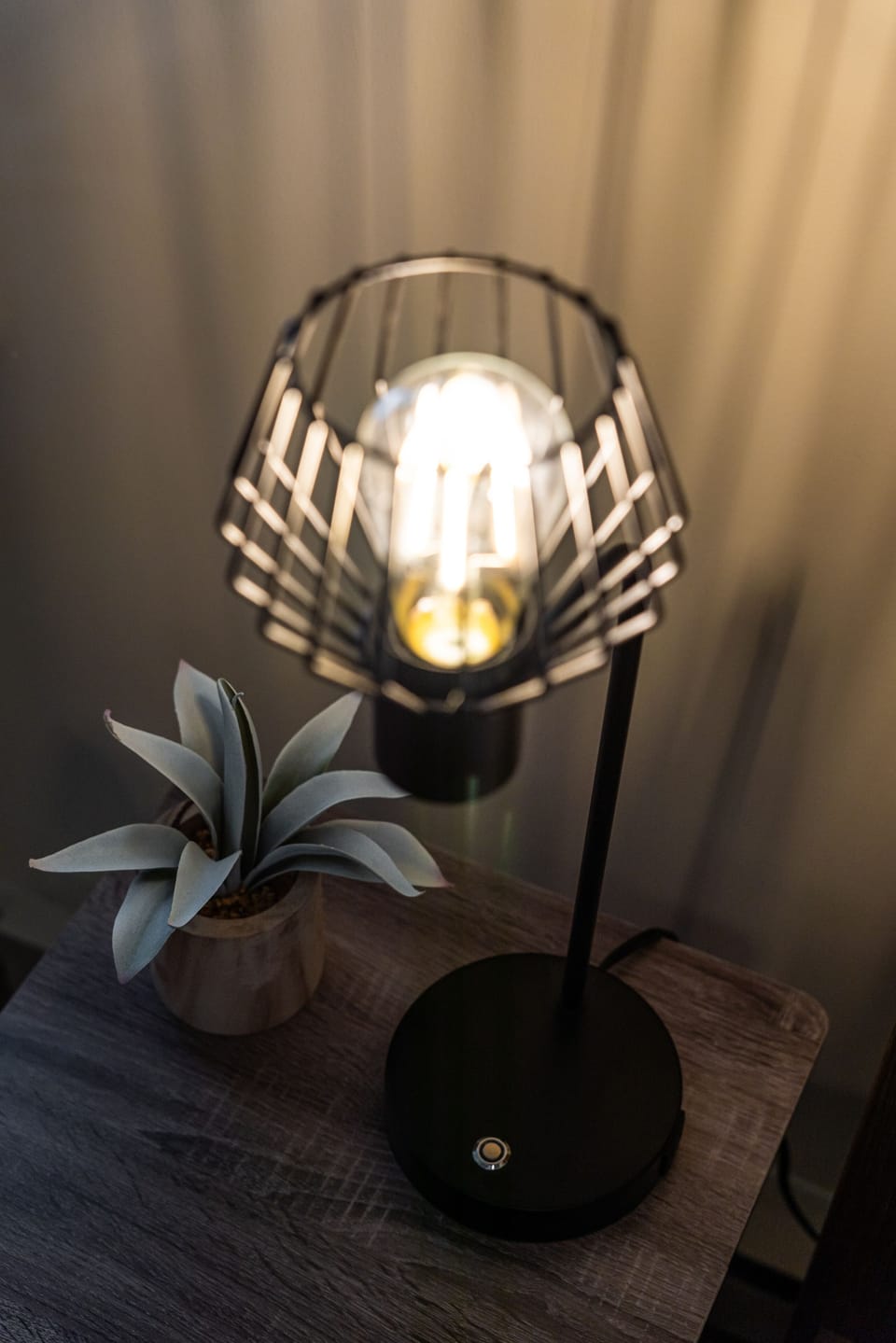 Two lamps in the master bedroom that contain USB charging ports.