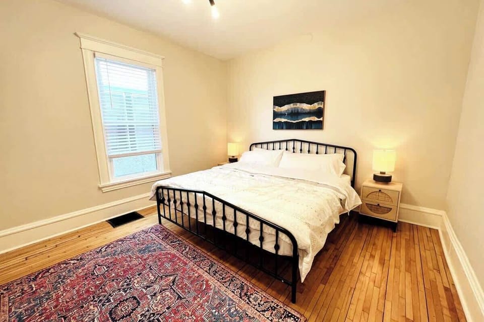 Master Bedroom with King Sized Bed. Medium Firm Mattress. Lightweight Comforter. 