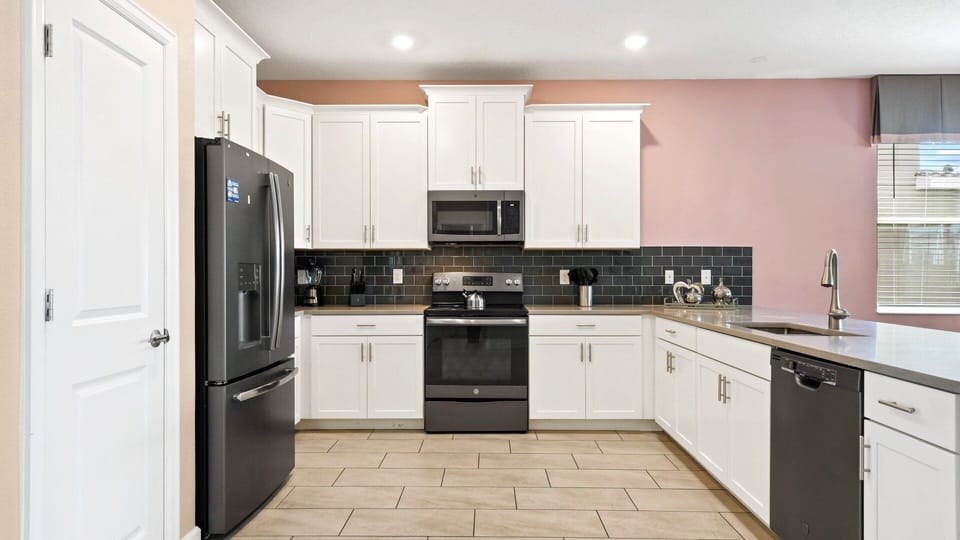 The large chef's kitchen comes equipped with everything you could need